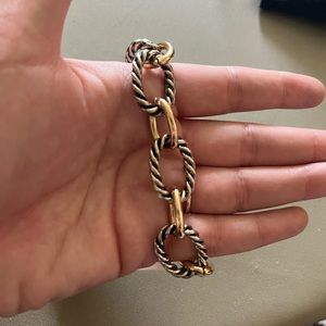 Gold, silver, and chrome chain link bracelet